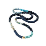 beaded gemstone necklace: shades of blue color block on white background