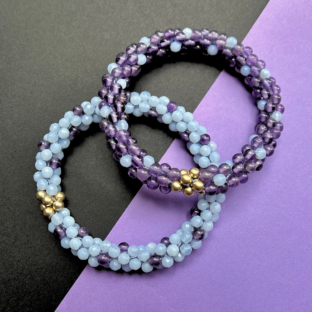 handmade beaded gemstone bracelets in dark and light purple polka dots and gold