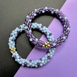 handmade beaded gemstone bracelets in dark and light purple polka dots and gold