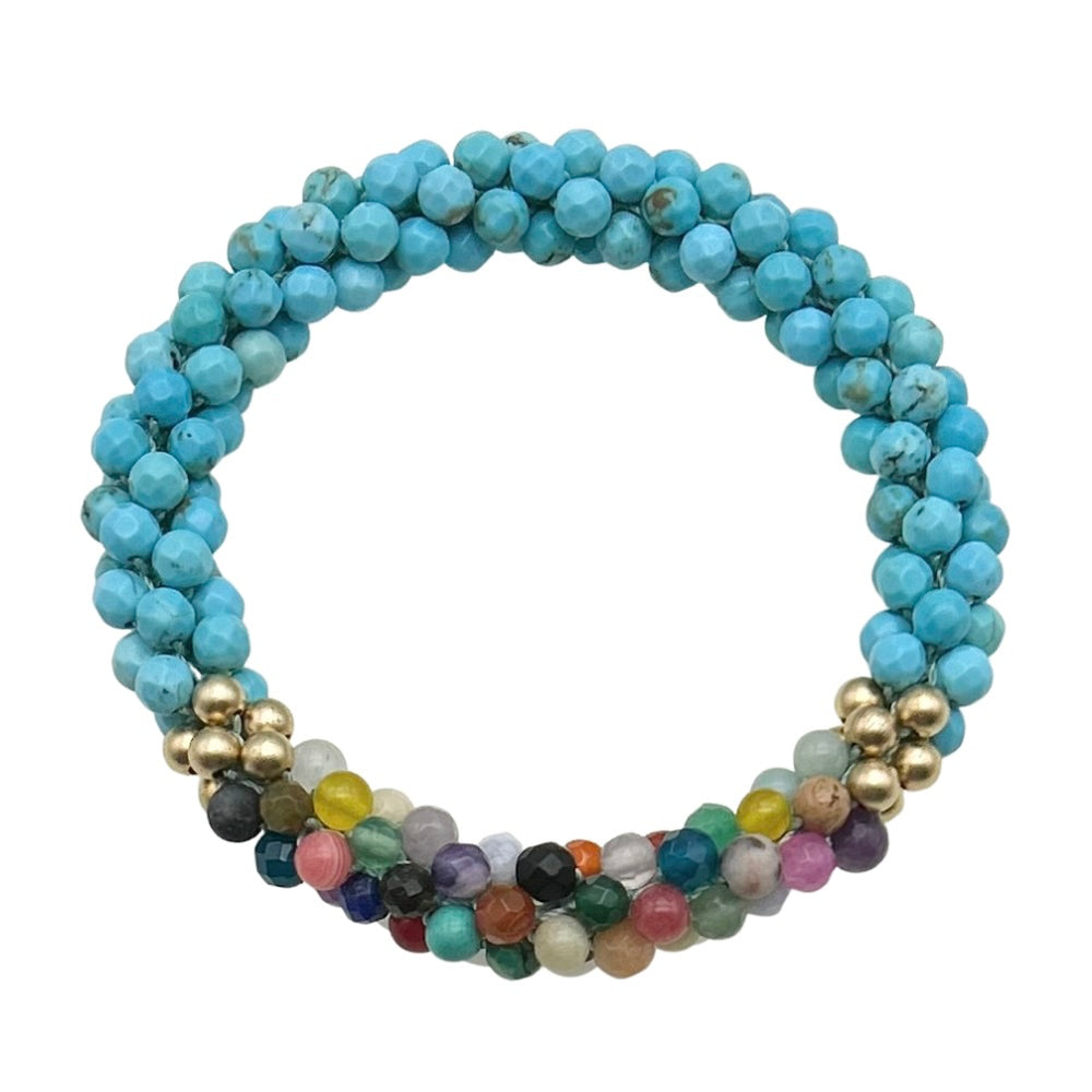 handmade beaded gemstone bracelet in turquoise with a multicolor accent on a white background
