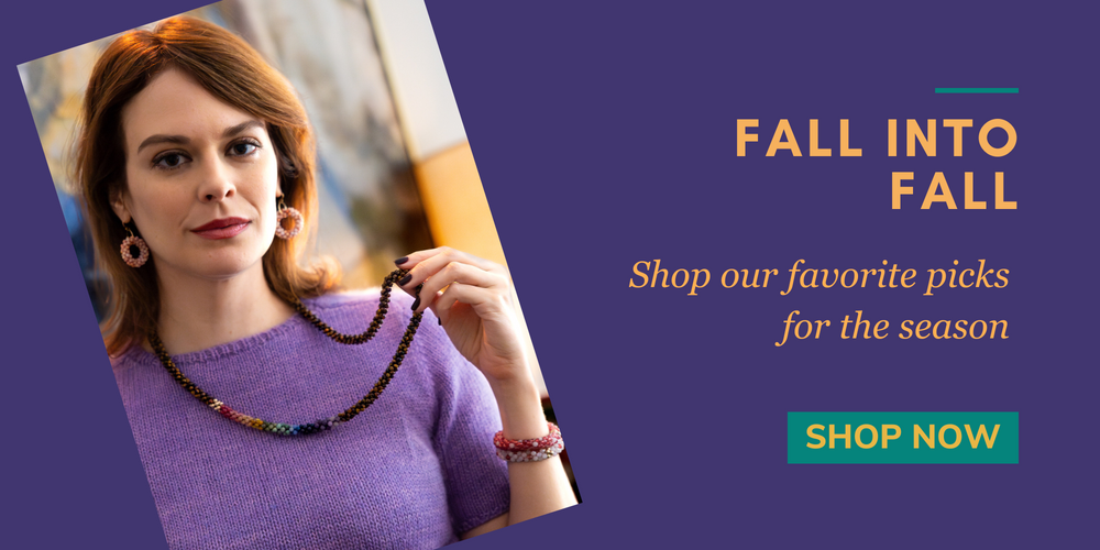 Woman holding a beaded necklace with promotional text for fall shopping on a purple background
