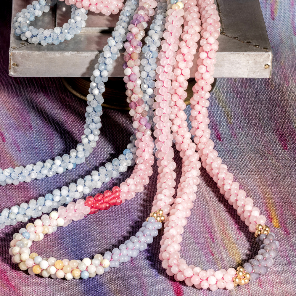 rose quartz, grey agate and gold beaded gemstone necklace with two other necklaces