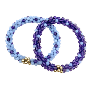 handmade beaded gemstone bracelets in dark and light purple polka dots and gold