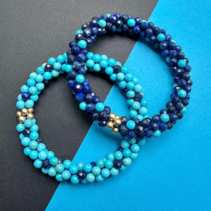 handmade beaded gemstone bracelets in light and dark blue polka dots and gold