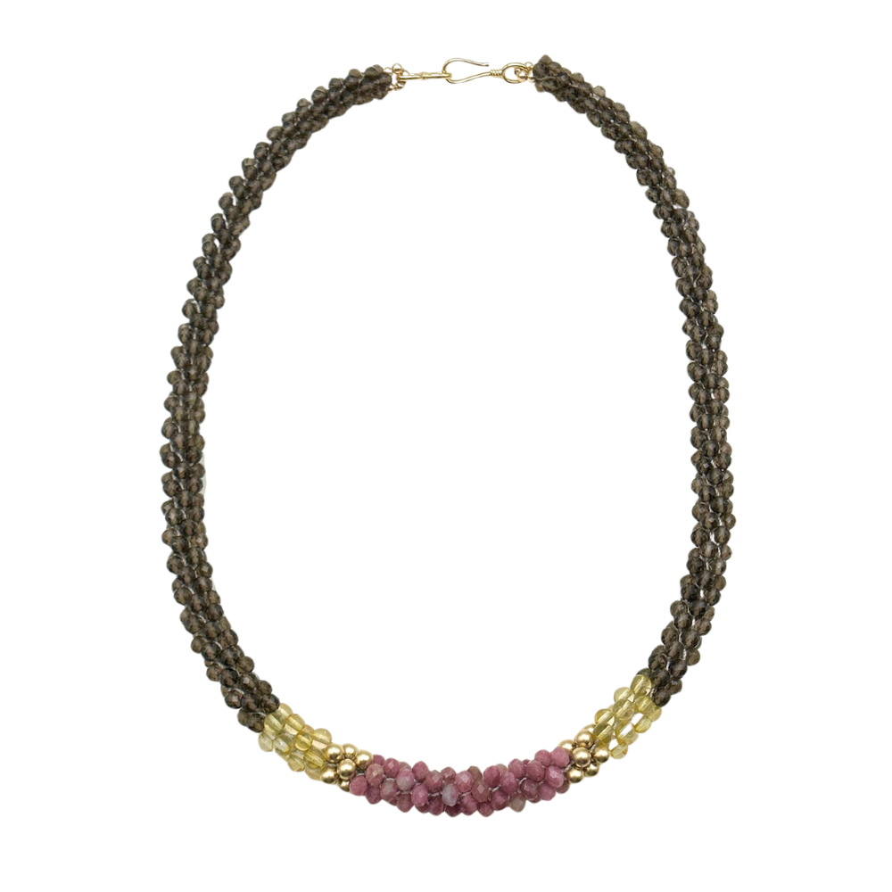 handmade beaded gemstone necklace in brown, yellow and pink with a clasp on a white background