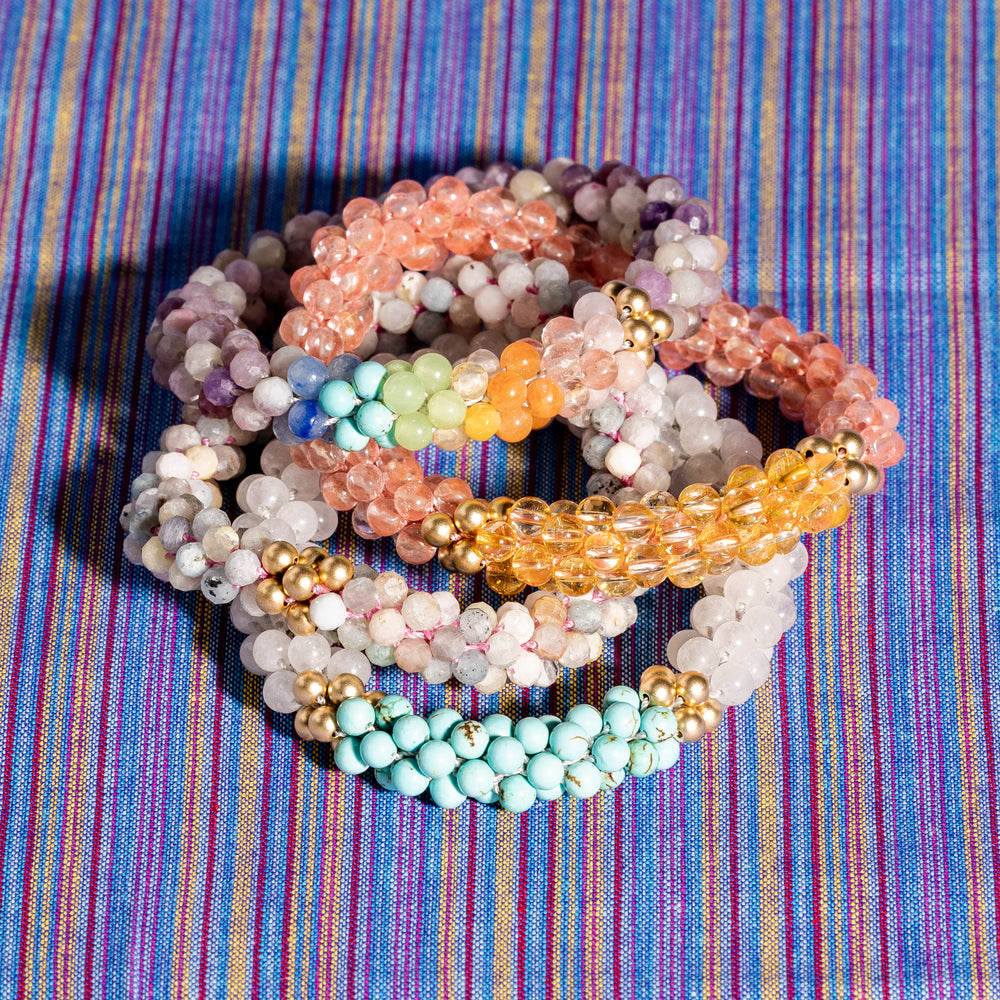 group of beaded gemstone bracelets