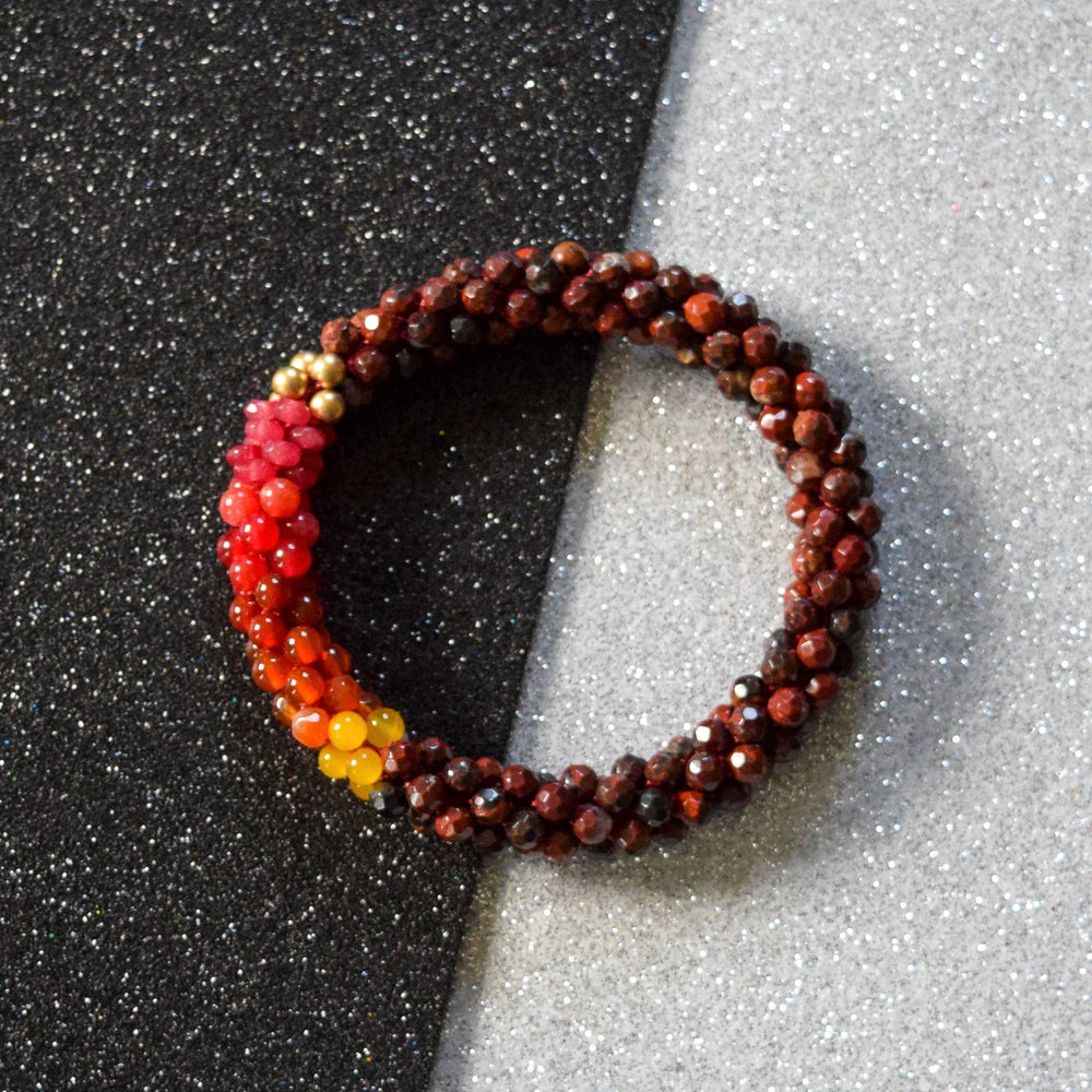 handmade beaded gemstone bracelet in aries zodiac colors