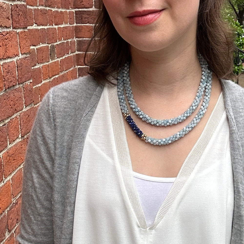 
            
                Load image into Gallery viewer, aquamarine, lapis and gold beaded gemstone necklace on model worn short
            
        
