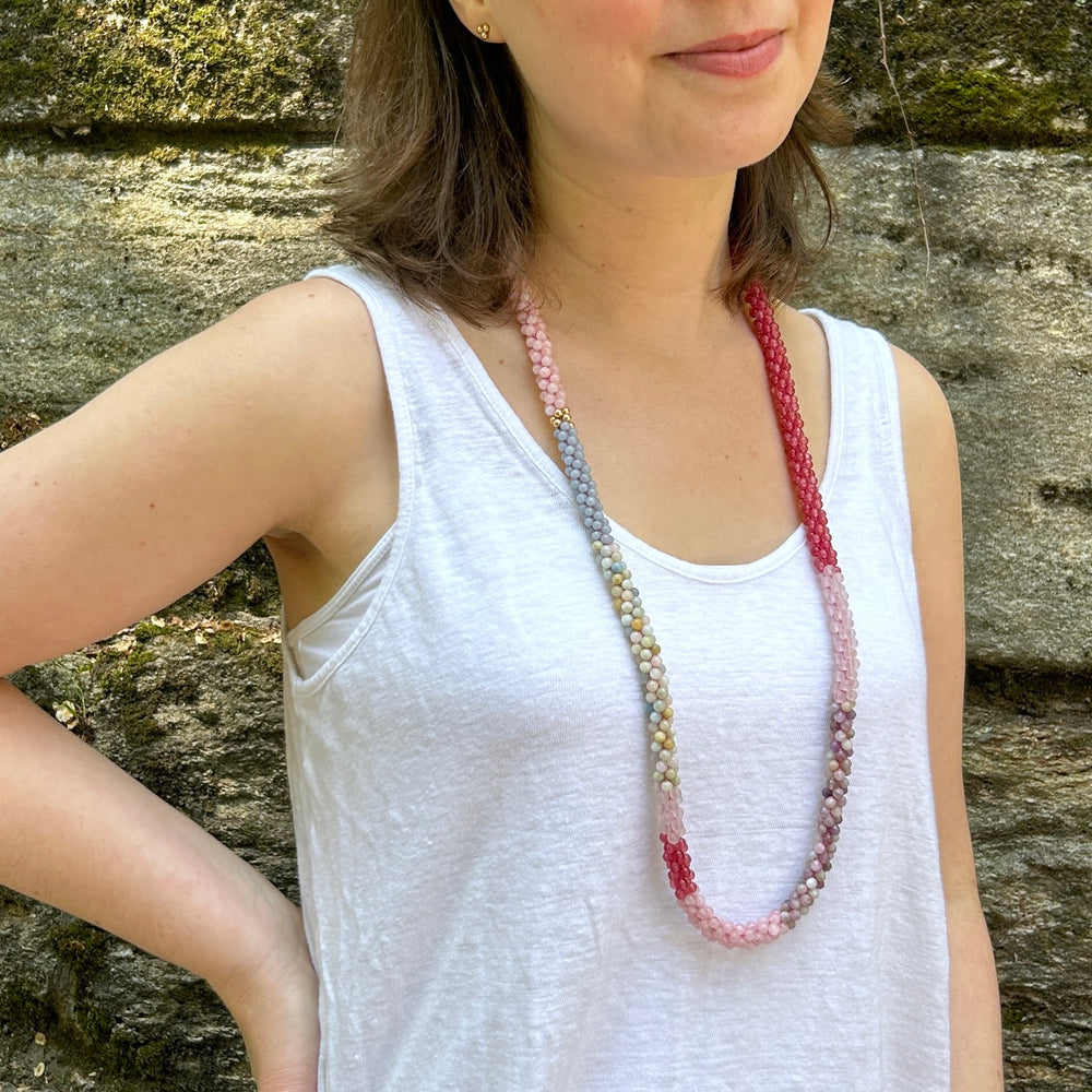 
            
                Load image into Gallery viewer, pink and grey beaded gemstone necklace on model
            
        