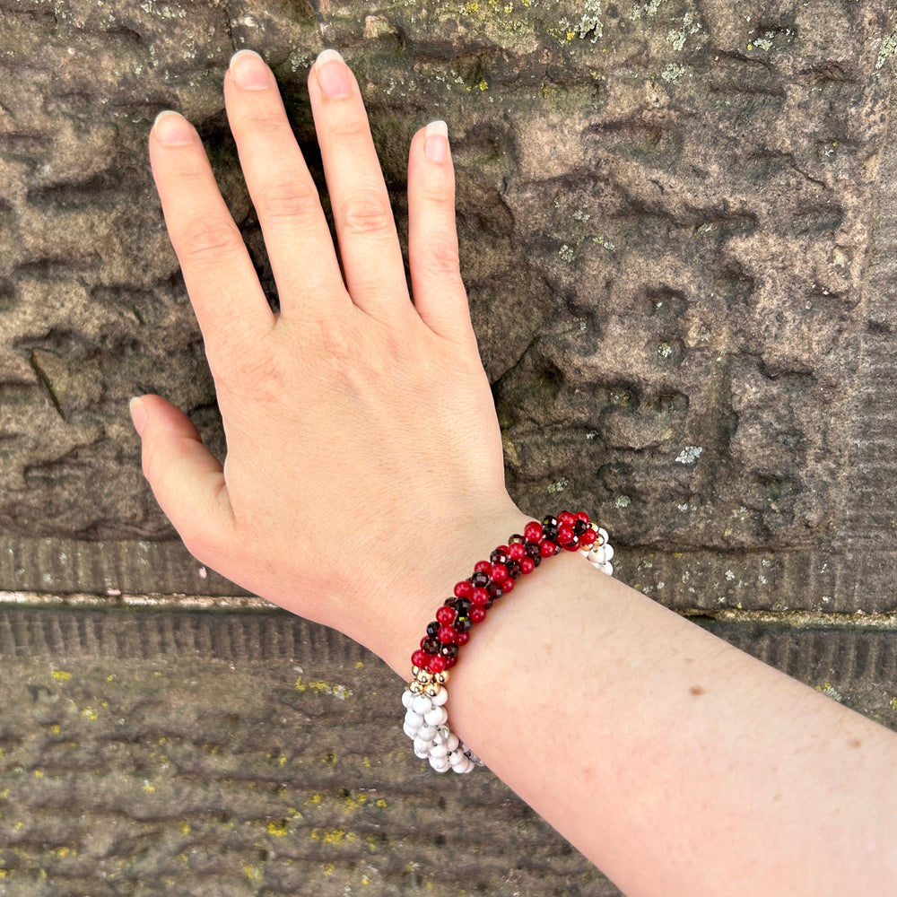 pride collection handmade beaded gemstone bracelet in white, red and gold on wrist