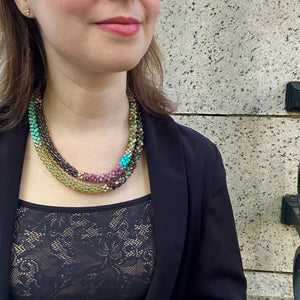 green garnet, chrysoprase, smoky quartz and gold beaded gemstone necklace worn doubled on model