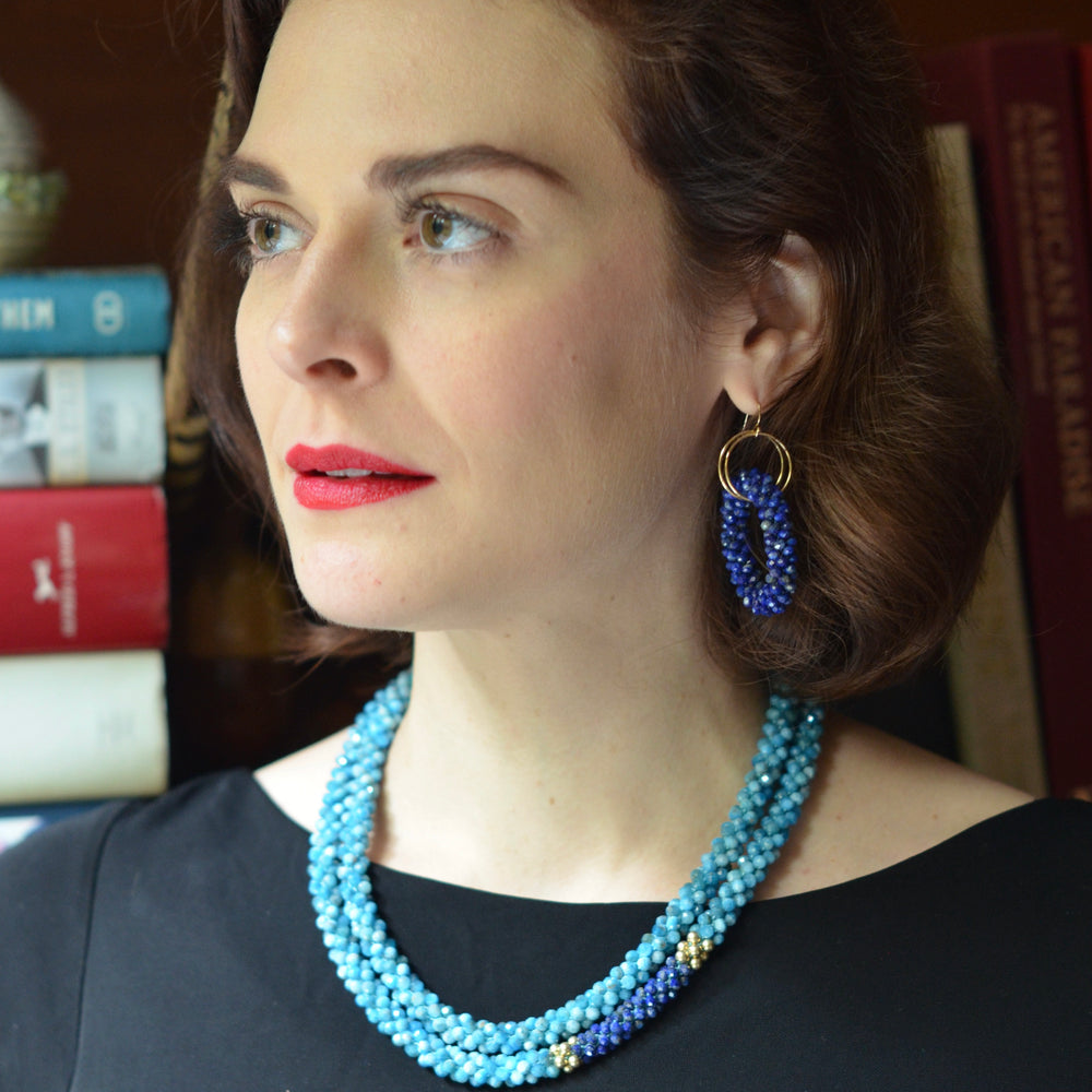 
            
                Load image into Gallery viewer, beaded gemstone earrings with large lapis rings and earwire on model with necklace
            
        