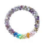 pastel rainbow, purple jade and gold beaded gemstone bracelet on white background