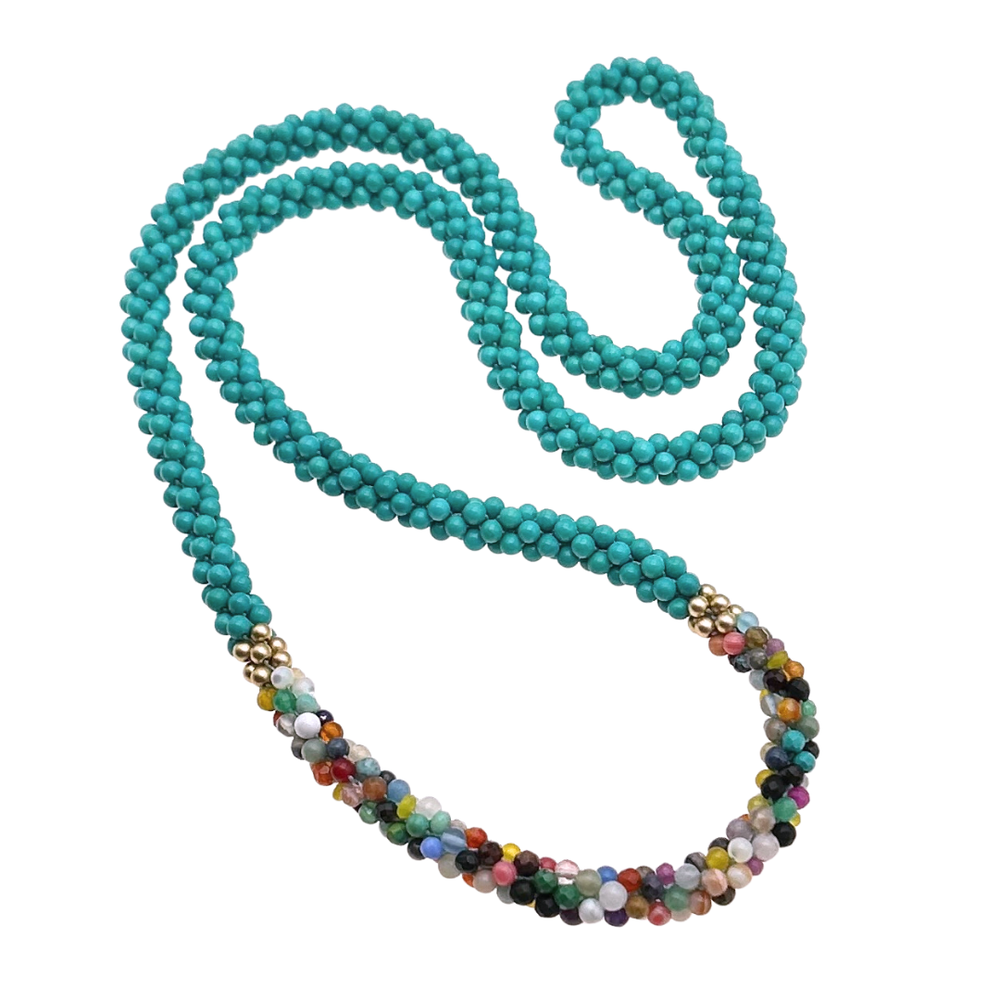 Handmade turquoise beaded necklace with multicolored accents on a white background