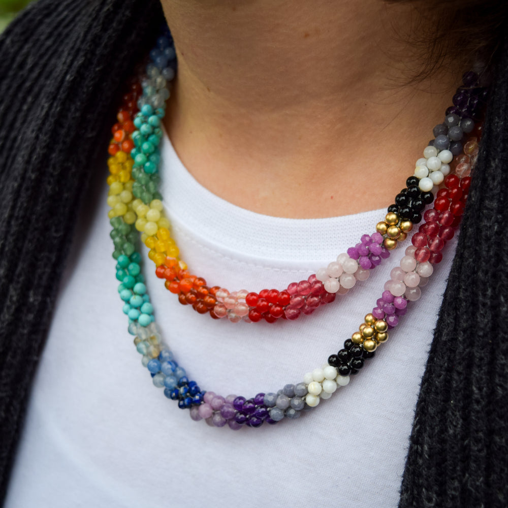 ultimate rainbow and gold beaded necklace on model worn doubled