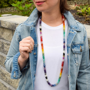 ultimate rainbow and gold beaded necklace on model worn long