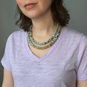 amazonite, sunstone and gold necklace worn doubled on model