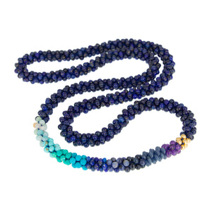 beaded gemstone necklace: ocean blue ombre, lapis and gold on white background