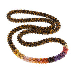 beaded gemstone necklace: fiery red ombre, tiger eye and gold on white background