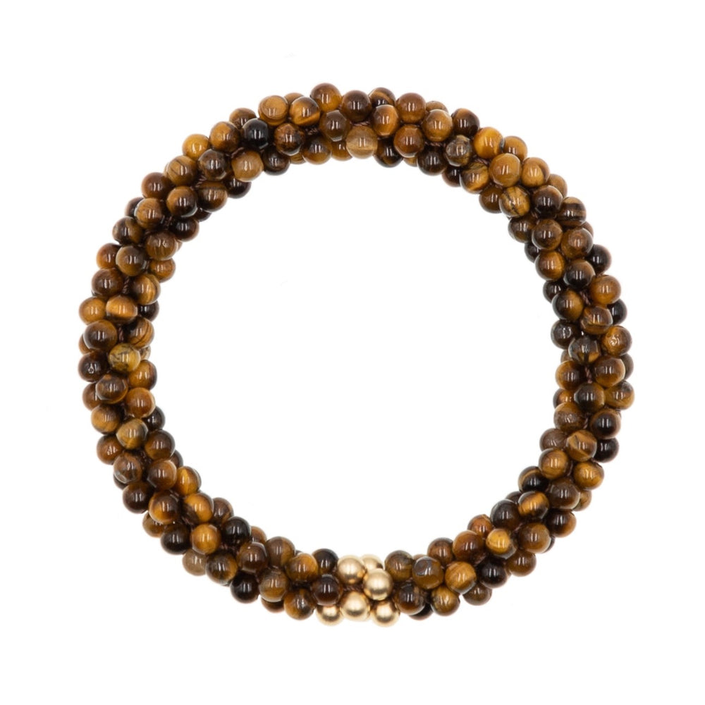beaded gemstone bracelet: tiger eye and gold on white background