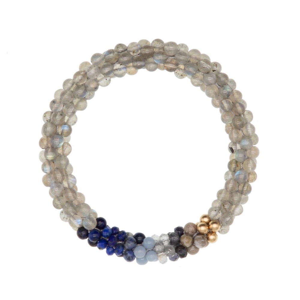 beaded gemstone bracelet: capricorn colors on white background