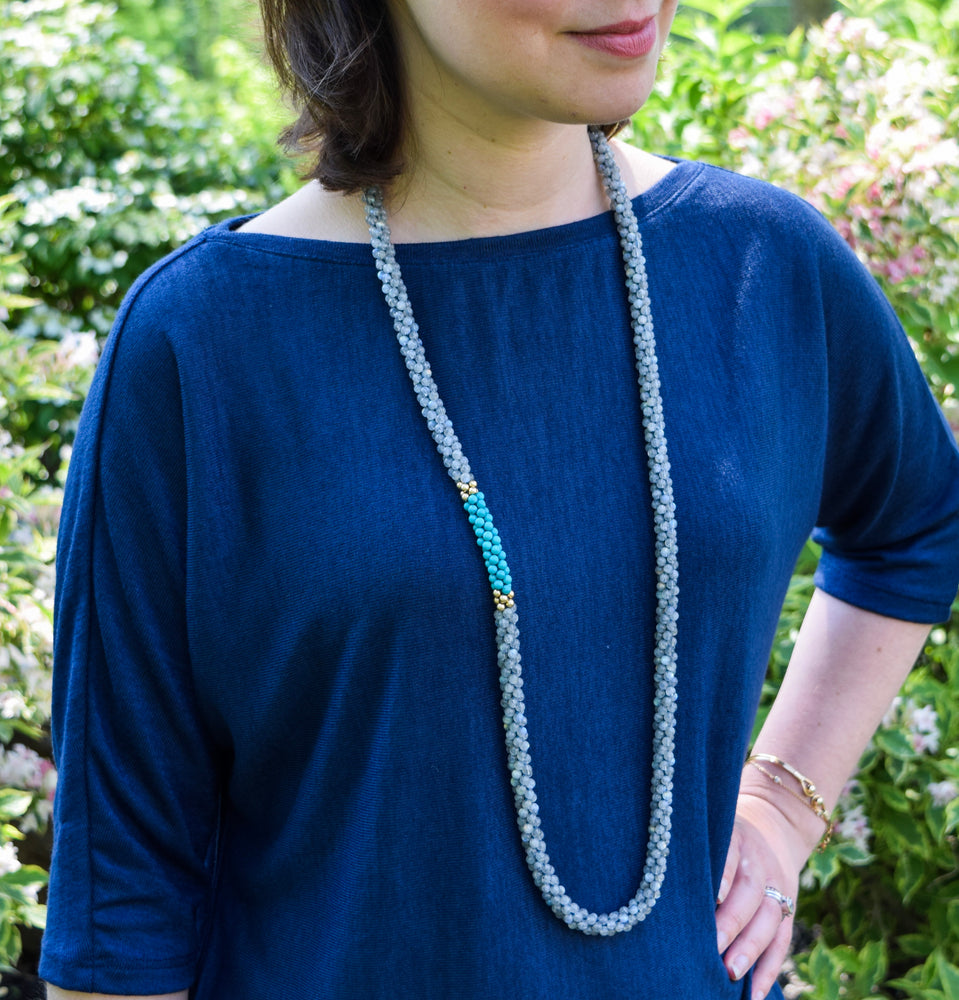 
            
                Load image into Gallery viewer, labradorite, turquoise and gold beaded necklace on model worn long
            
        