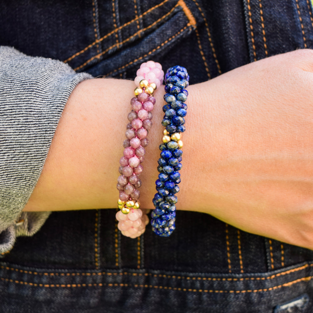 
            
                Load image into Gallery viewer, rose quartz, pink lepidolite and gold bracelet on model worn with another bracelet
            
        