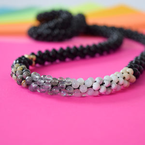 
            
                Load image into Gallery viewer, detail of black and white ombre necklace
            
        