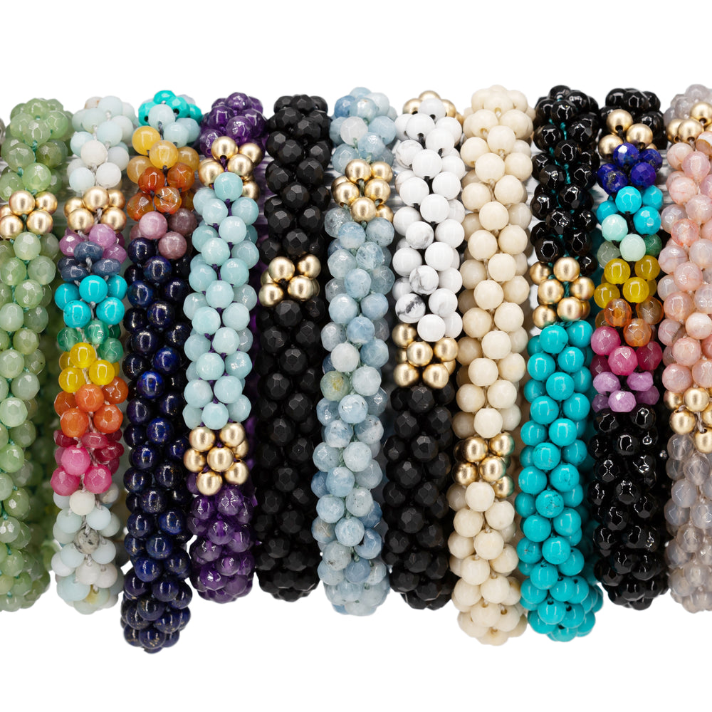 
            
                Load image into Gallery viewer, group of beaded gemstone bracelets
            
        