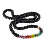 beaded gemstone necklace: rainbow, black onyx and gold on white background