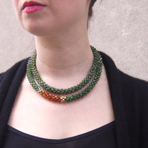 jade, carnelian and gold beaded necklace on model worn doubled