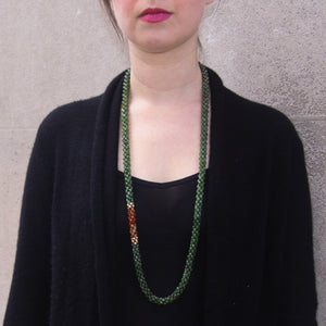 jade, carnelian and gold beaded necklace on model worn long