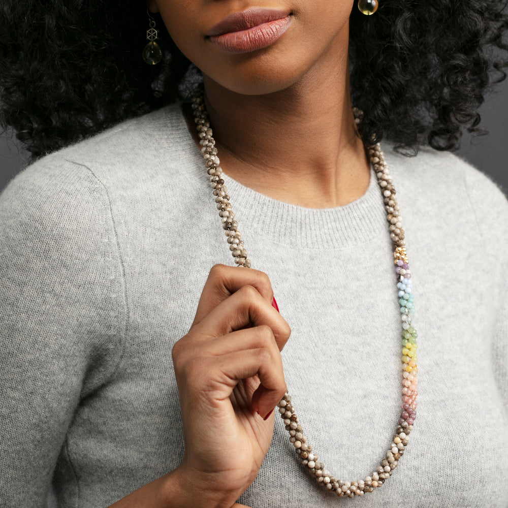 
            
                Load image into Gallery viewer, rainbow, jasper and gold beaded necklace on model
            
        