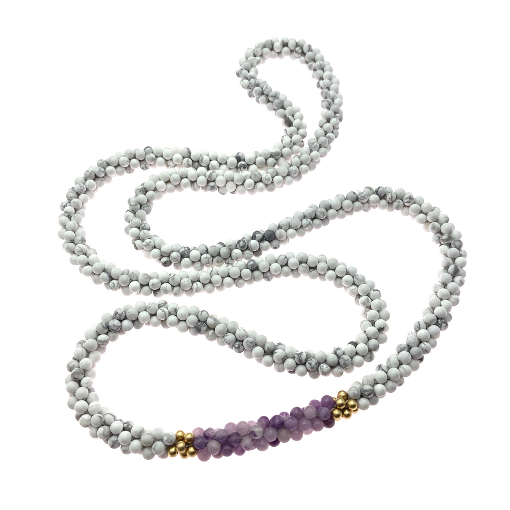 beaded gemstone necklace: howlite, purple jade and gold on white background