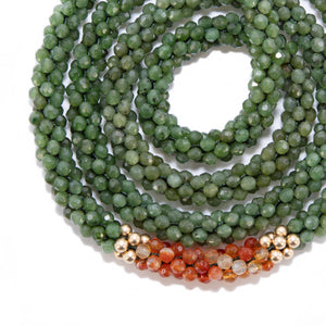 
            
                Load image into Gallery viewer, detail of jade, carnelian and gold beaded gemstone necklace
            
        